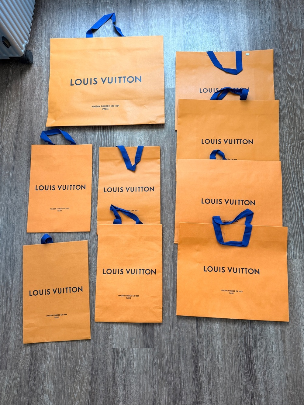 9x Louis Vuitton authentic Shopping Bags with Blue Ribbon Handles - Assorted Set